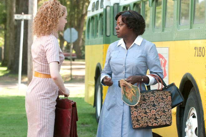 Emma Stone, left, and Viola Davis are shown in a scene from "The Help."