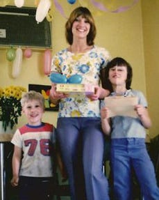 Joy Hibbs in an undated photo with her two kids, Angie and
David. She was murdered at the age of 36 in her Bristol Township
home in April 1991. The killing remains unsolved.