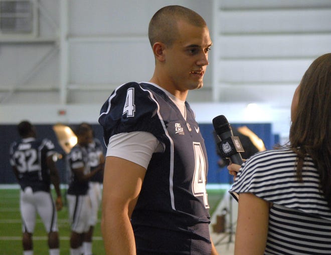 University of Connecticut quarterback Mike Box is interviewed during UConn football's media day at the Burton Family Football Complex in Storrs Friday, August 12, 2011.