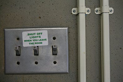 Stickers offer reminders to conserve energy at schools in Holmdel Township, N.J.