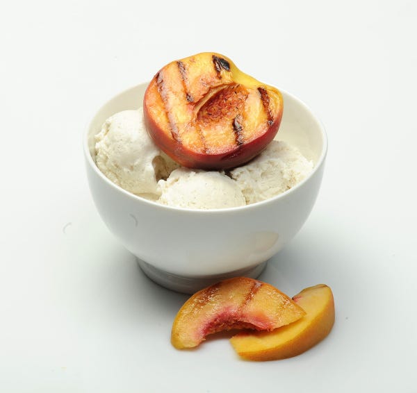 Classic Grilled Peaches served with ice cream