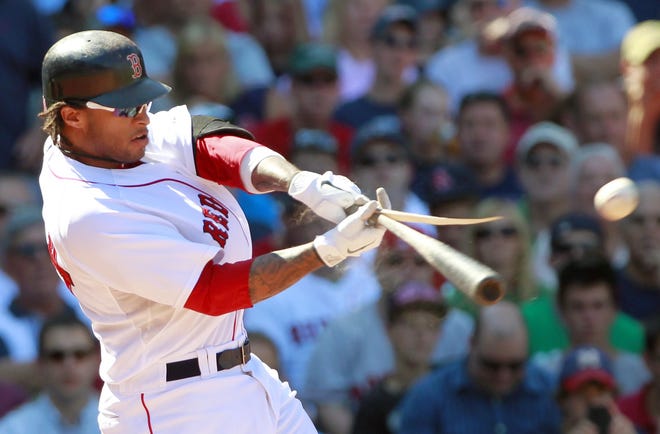 Boston's Darnell McDonald cracks his bat on a fly out to left field yesterday.