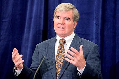 This is an Aug. 9, 2011, file photo showing NCAA president Mark Emmert during a news conference in Indianapolis. Emmert says if the allegations against the University of Miami are true, it's yet another reason to make fundamental changes to college sports. Emmert issued a statement Wednesday, Aug. 17, 2011, after Yahoo! Sports reported a laundry list of allegations by a former Hurricanes booster. (AP Photo/Michael Conroy, File)