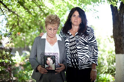Harriet Salarno, with a photo of a daughter killed in 1979. She and her daughter Nina Salarno Ashford, right, help represent victims at parole hearings.