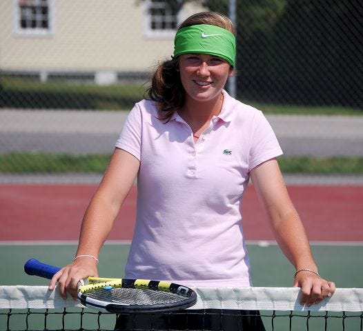 Pike/Democrat photo
St. Thomas Aquinas' Julia Keenan has been named Foster's girls tennis player of the year for the third year in a row.
