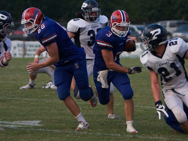 Sumter Academy running back Paul Reed (3) runs against Patrician Academy in the season opener Friday night in York.