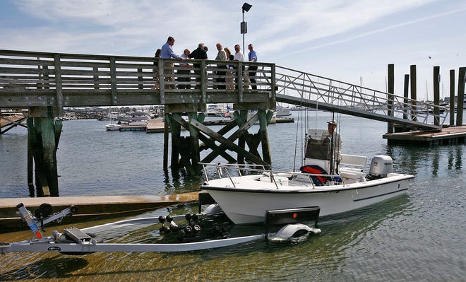 Renovations to the Scituate Harbor recreational boat ramp off Jericho Road were celebrated by town and state officials on Wednesday, Aug. 24, 2011. In the photo, Robert Anzalone of Marshfield pulls his boat up to his trailer after doing some striper fishing.