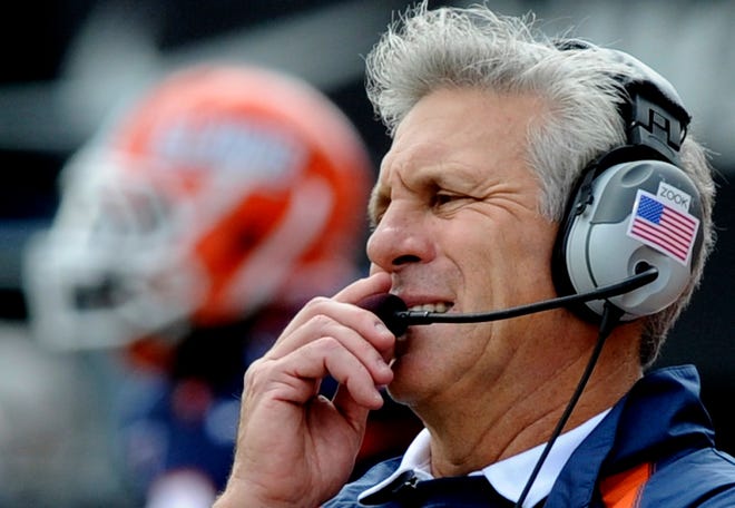 Illinois head coach Ron Zook watches the action during Saturday's Big Ten opener at Champaign.
