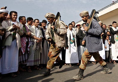 Yemeni soldiers danced Tuesday in Sana on the Id al-Fitr holiday as protesters watched, at the site of a demonstration demanding their president's resignation.