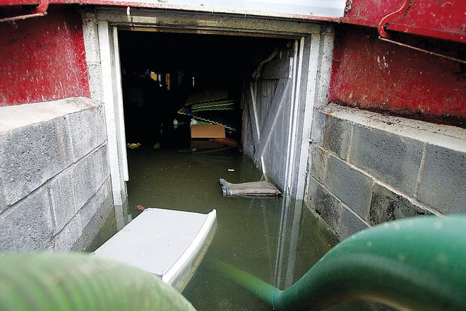 Photo by Daniel Freel/New Jersey Herald 
The basement of a Newton-Swartswood Road home in Stillwater owned by June Steele is seen flooded Monday following Hurricane Irene. Residents are encouraged to wear boots and gloves when dealing with a flooded basement as the stormwater could contain pathogens, bacteria and black mold.