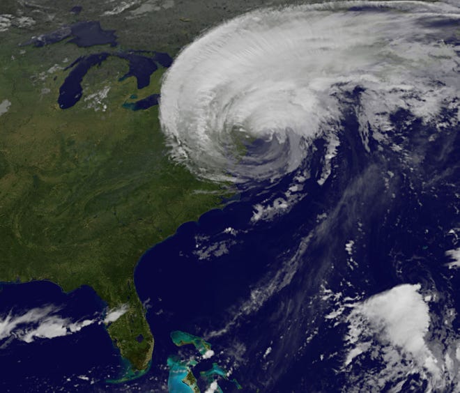 This image made available by the NASA/NOAA GOES Project shows Hurricane Irene on the East Coast of the United States at 5:32 a.m. EDT on Sunday, Aug. 28, 2011. (AP Photo/NASA/NOAA GOES Project)