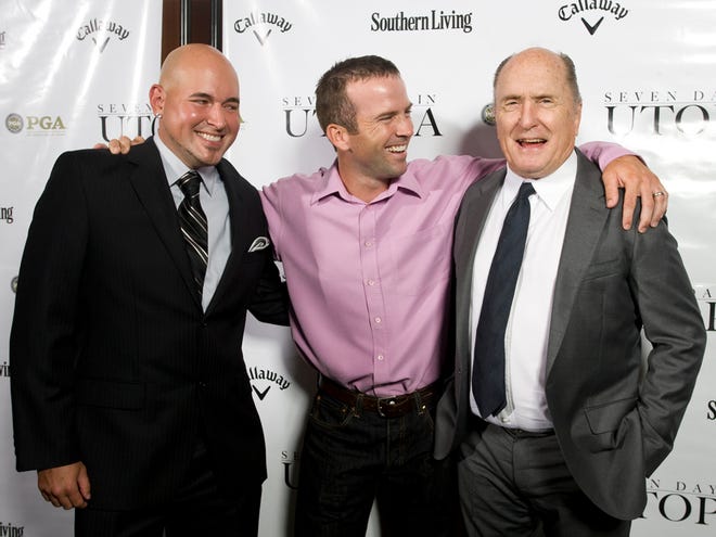 Robert Duvall, right, with director Matt Russell, left, and Lucas Black arrive at the premiere of the film “Seven Days in Utopia.” (The Associated Press)