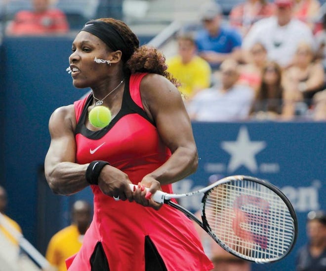 Serena Williams returns a shot to Michaella Krajicek of the
Netherlands during the U.S. Open tennis tournament Thursday in New
York.