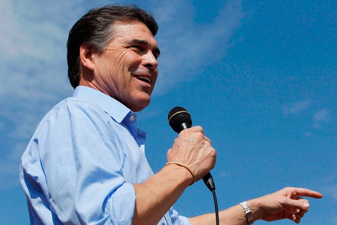 Republican presidential candidate, Texas Gov. Rick Perry speaks at the Iowa State Fair in Des Moines, Iowa on Aug. 15. (The Associated Press)