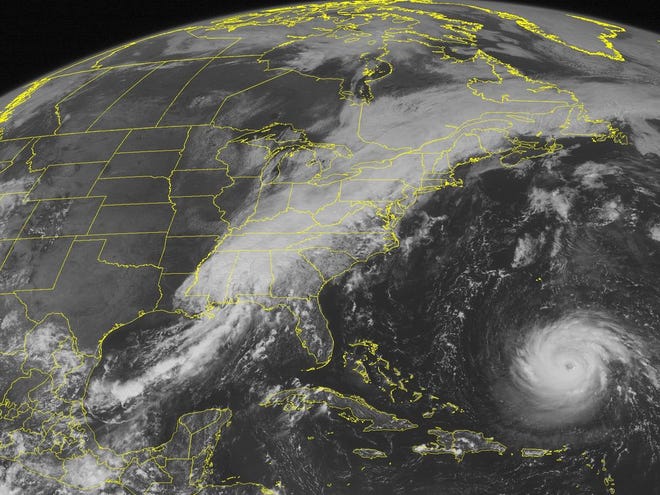 This NOAA satellite image taken Monday shows a swirl of clouds in the Atlantic Ocean associated with Hurricane Katia. (AP Photo/Weather Underground)