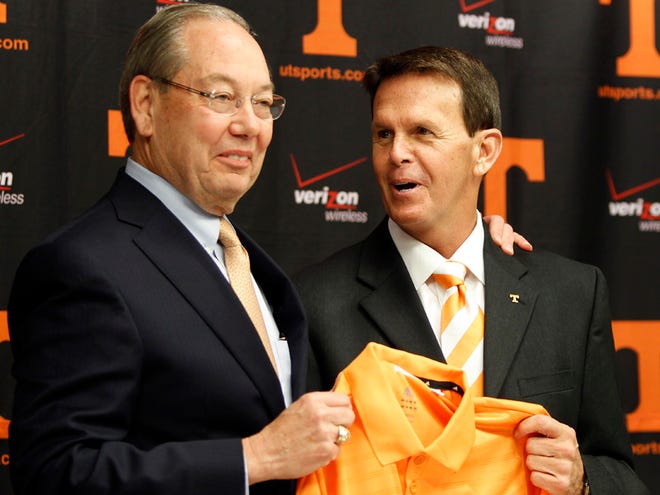 Tennessee Chancellor Jimmy Cheek, left, and Dave Hart, former Alabama executive director of athletics, announce that Hart is the new vice chancellor and athletic director for Tennessee on Monday.
