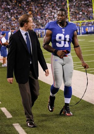 (AP Photo/Bill Kostroun) New York Giants' Justin Tuck suffered a neck injury in a preseason game against the Jets on Aug. 29..