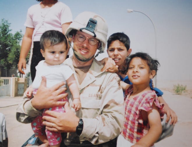 Submitted photo of Ilion resident Michael Sportello while in Garma, Iraq, during his re-enlistment in the Army following the September 11, 2001 terrorist attacks.