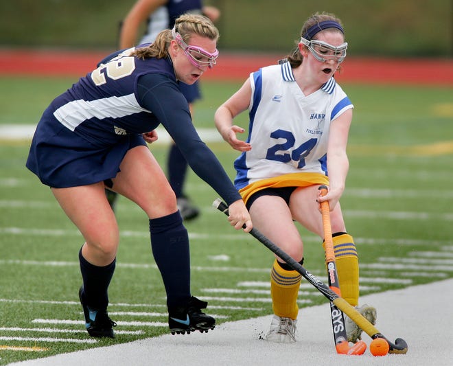 East Bridgewate'sr Cecelia Cacciatore and Hanover Katherine Valles battle for the ball during Thursday's game.