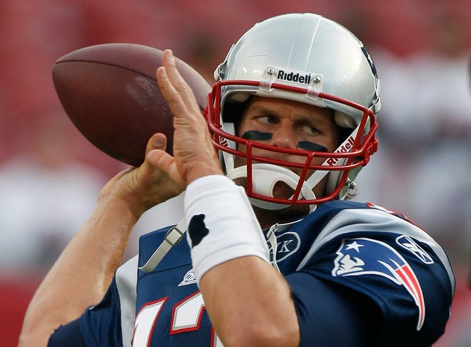 New England Patriots quarterback Tom Brady (12) before an NFL preseason football game against the Tampa Bay Buccaneers Thursday, Aug. 18, 2011 in Tampa, Fla. (AP Photo/Chris O'Meara)