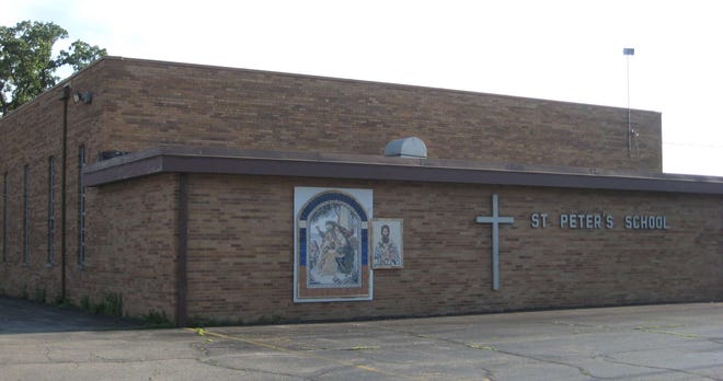 Plans for a new building for St. Peter Catholic School, pictured in July 2011, were halted despite three years of work by parishioners, who raised more than $2.5 million, about 75 percent of the cost of the project.