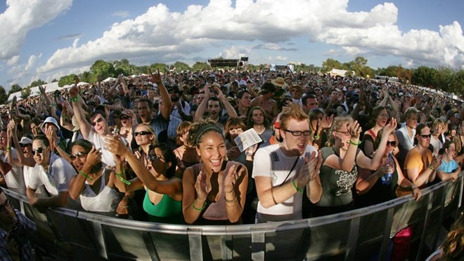 Music fan's paradise: The crowd cheers for Gomez on opening day of the fifth festival. After the 2005 dust bowl, fest organizers paid half of the cost to install a new irrigation system in Zilker Park to improve conditions. Musical stars that year included Tom Petty and the Heartbreakers, Flaming Lips and Matisyahu.