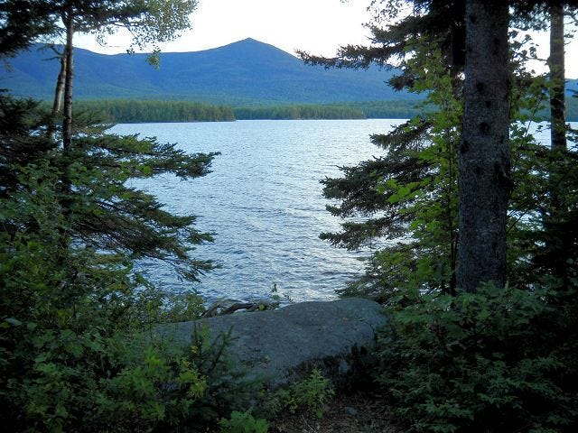 The view from a porch overlooking Flagstaff Lake and Mount Bigelow in Maine as the sun was setting.