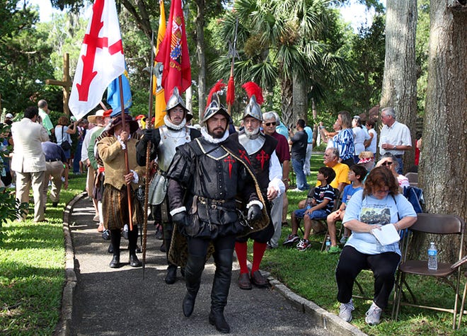 Don Pedro Menendez de Aviles, portrayed by Chad Light, leads a procession to mass after a re-enactment of his landing, 446 years ago, at the Mission of Nombre de Dios on Saturday morning.