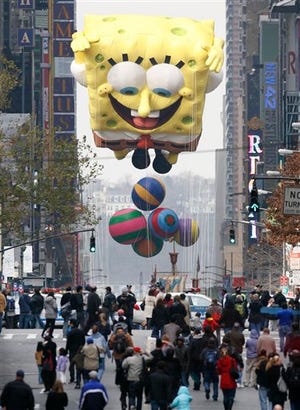In this Nov. 26, 2009 file photo, a float representing the animated character SpongeBob is moved east on 42nd Street along the new route of the Macy's Thanksgiving Day Parade, in New York. The cartoon character SpongeBob SquarePants is in hot water from a study Monday, Sept. 12, 2011, suggesting that watching just nine minutes of that program can cause short-term attention and learning problems in 4-year-olds. (AP Photo/Peter Morgan, File)