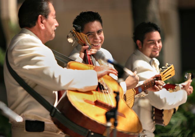 Members of International Latino Mariachi perform Saturday afternoon during the Gainesville Hispanic Festival in the Downtown Plaza, Sept. 2007.