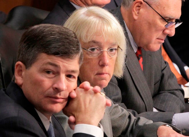Joint Select Committee on Deficit Reduction Co-Chairs Rep. Jeb Hensarling, R-Texas, left, and Sen. Patty Murray, D-Wash., center, listen as Congressional Budget Office Director Douglas Elmendorf testifies before the committee on Capitol Hill in Washington on Tuesday. At right is committee member, Senate Minorty Whip Jon Kyl of Arizona. (The Associated Press)