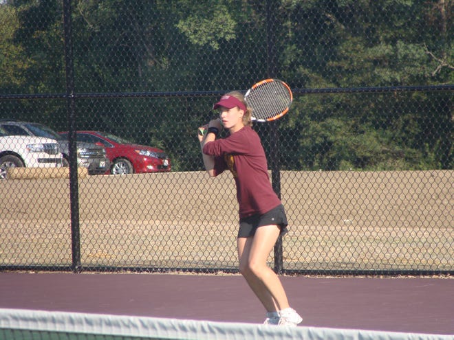 Molly Mathes returns a shot Wednesday against Peoria Notre Dame. Mathes won her match in straight sets.