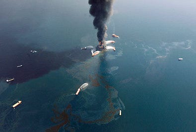 The Deepwater Horizon oil drilling rig burning at a well in the Gulf of Mexico in April 2010.