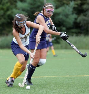 Photo by Daniel Freel/New Jersey Herald 
 Jefferson's Vienna Castrignano, left, controls the ball as Pope John's Lauren Grosso defends during their game Thursday in Sparta. The Falcons won, 1-0, on Castrignano's goal.