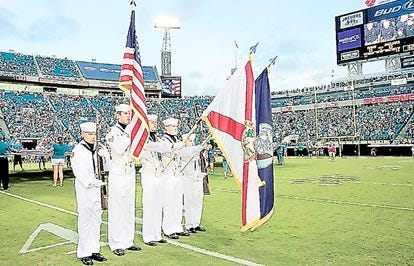 St. Augustine Navy League Sea Cadet battalion as they presented the colors at the recent Jaguars preseason game in Jacksonville. Contributed photo