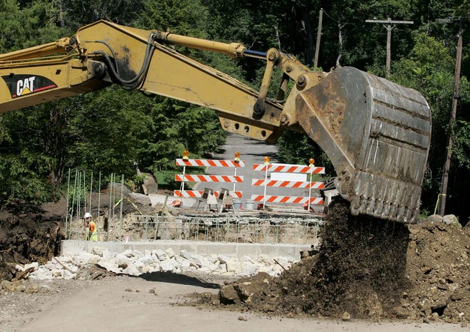 A storm sewer is dug by Martin & Co. Excavating on Wednesday, Sept. 7, 2011, on Stoneridge Close in Rockford.