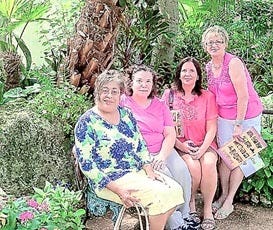 Poinsettia Garden Circle ended its 2010-11 season with a visit to the Florida Museum butterfly garden in Gainesville. From left: Doni Dowie, eLaine Beale, outgoing president; Janice Bequette and Barbara Lockner. Contributed photo