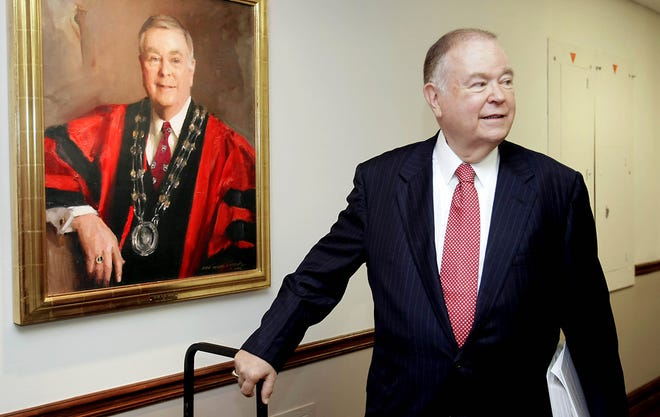 Oklahoma President David Boren stopped in front of a portrait of himself to speak with reporters Monday night. Oklahoma expressed an interest to leave the Big 12 for the Pac-12, but the Pac-12 announced Tuesday night it wouldn’t expand at this time.