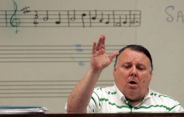 File photo by Amy Paterson/New Jersey Herald   
 
Former Kittatinny Regional High School Music Teacher and Choral Director Joseph Mello will be honored with an alumni concert this weekend that will feature 150 of the students he taught.