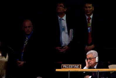 The Palestinian president, Mahmoud Abbas, listened Wednesday as President Obama spoke at the United Nations.