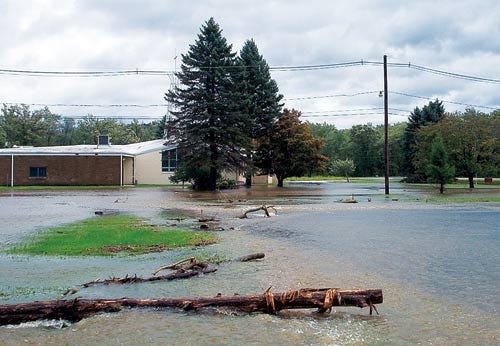 Submitted Photo - Water covers the ground after recent storms at the proposed site of a 150-foot cell tower on Swartswood Volunteer Fire Department property off Swartswood Road in Stillwater.