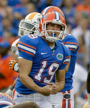 Florida kicker Caleb Sturgis (19) celebrates a 42-yard field goal during the second half of an NCAA college football game against Tennessee, Saturday, Sept. 17, 2011, in Gainesville, Fla. Sturgis kicked four field goals in the 33-23 victory over Tennessee. (AP Photo/John Raoux)