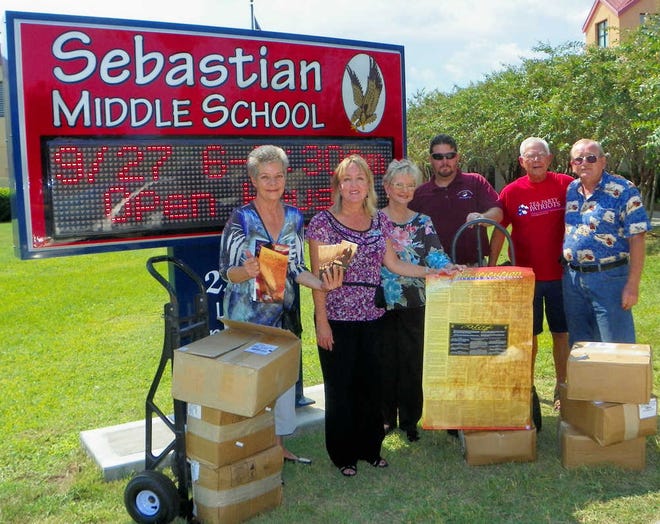 Members of the St. Johns County Tea Party delivered 5,000 pocket-size copies of the U.S. Constitutions to St. Johns County school students.