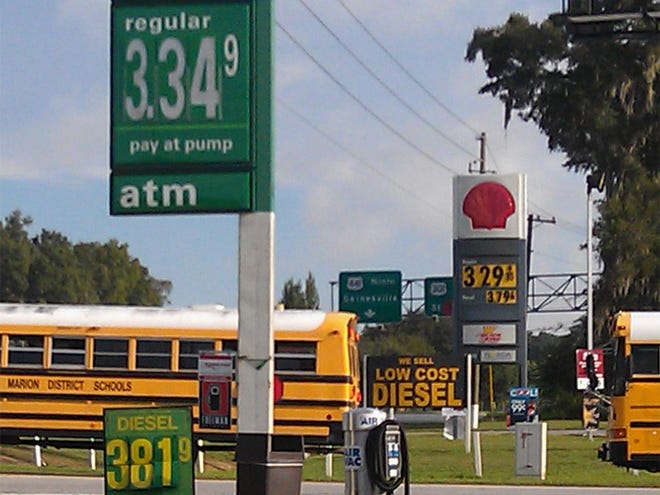 Gas prices have dropped over the past week at area gas stations. These gas stations at North U.S. 441 and County Road 329 in Marion County, Fla., show prices of $3.29 and $3.34 a gallon of regular on Monday, Sept. 26, 2011.