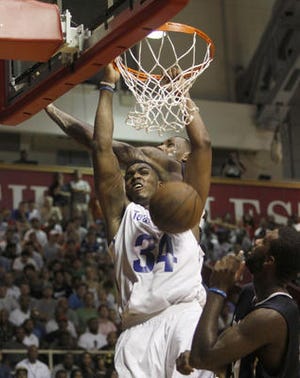 Team Philly's Jason Thompson, a Lenape High School graduate who
now plays for the Sacramento Kings (34) scores against Team Melo in
the second half of the "Battle of I-95" basketball game Sunday in
Philadelphia. Philly won 131-122. (AP Photo/H. Rumph Jr)