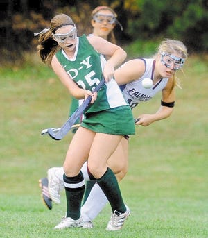 Maria Beatrice, left, of Dennis-Yarmouth and Amy Wilson of Falmouth battle for control of the ball in Monday's Atlantic Coast League match. D-Y won 2-0 to remain undefeated.