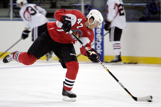 Darcy Campbell (47) takes a shot on the goal Sunday, Sept. 25, 2011, during an IceHogs practice session at the BMO Harris Bank Center in Rockford.