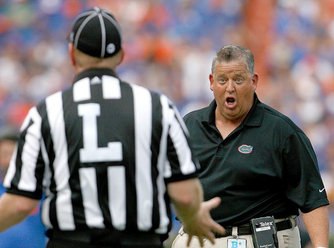 Florida offensive coordinator Charlie Weis talks to the referee against Tennessee at Ben Hill Griffin Stadium on Sept. 17. Florida hosts Alabama on Saturday night at 8. It will be televised on CBS.