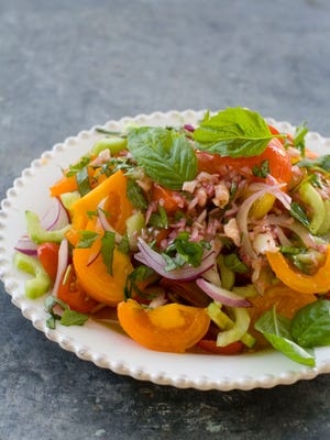 For The Associated Press' 20 Salads of Summer series, Alice Waters offered this recipe for a simple but stunning heirloom and cherry tomato salad. (The Associated Press)