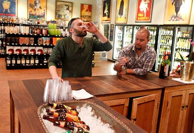 Rusty Baldwin, left, and Matt Kennamer at Red Dog Wine and Spirits near Nashville. Tennessee now allows alcohol tastings.